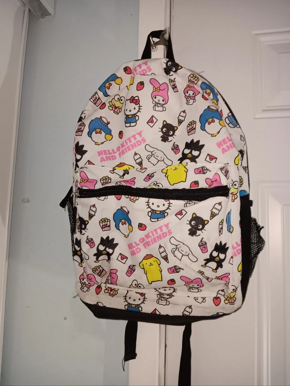 Sanrio White Backpack with Pink, Blue, Yellow and Black Character Print